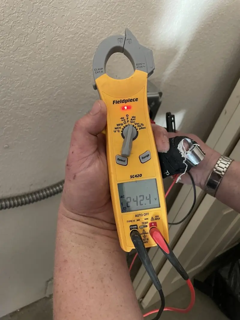 Voltage testing with clamp meter during Circuit Breaker Repair in East Hills